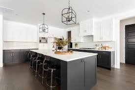 white kitchen with black island