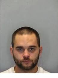 Store employee locks up robber