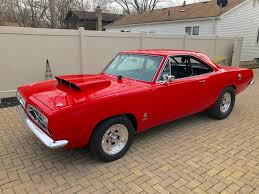 Image result for Bright Red 1967 Barracuda