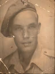 Please can anyone help? This is the only picture of my maternal Grandfather  from WW2. Can someone remove the wires and enhance (perhaps colourising)  please? I wish to have it mounted with