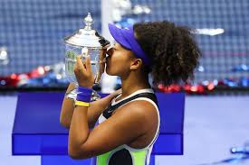 Сумка boite chapeau souple pm. Naomi Osaka Poses In A Colorful Dress While Flaunting Her Curly Hair A Chic Louis Vuitton Bag