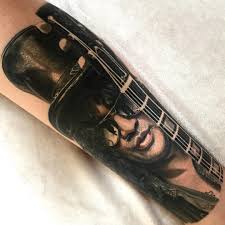 Check out the hidden meanings behind these 11 prison tattoos. Slash Portrait