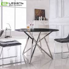 This dining table features stainless steel legs at an angle and a clear tempered glass top for. China Modern Stainless Steel Base Round Glass Top Dining Table China Glass Dining Table Glass Table