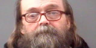 Kellett charged in dog shooting, break in