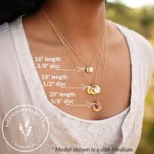 It's an excellent hedge against inflation because its price usually rises when the cost of living increases. Tiny Gold Initial Charm Necklace Modern Simple Mommy Jewellery Piccola Jewelry
