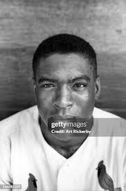 Closeup portrait of St. Louis Cardinals Bill White in dugout during... News  Photo