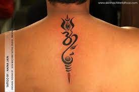 Done This Beautiful Lord Shiva Elements And Lord Ganesha Originally Designed By Skin Machine Tattoo Stud Trishul Tattoo Designs Shiva Tattoo Design Neck Tattoo