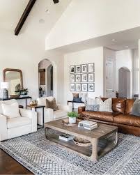 Love This Open Layout Livingroom With Off White Walls And Leather Openconcept Livingroom Farm House Living Room Farmhouse Decor Living Room White Living Room
