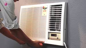The unit sits on the floor. Lg Air Conditioners Window Ac Filter Cleaning Youtube