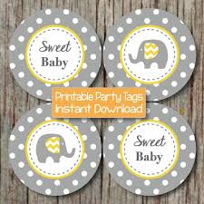 The glass elephant with a little crown is adorable, though a bit more expensive. Baby Shower Cupcake Toppers Yellow Bumpandbeyonddesigns