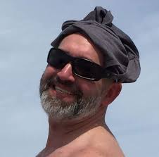 Why does the transmission downshift when driving downhill and can it be  adjusted?