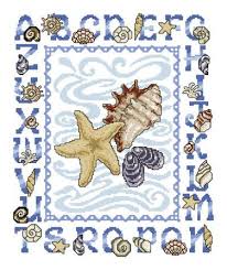 Model stitched on 14 ct. Seashell Alphabet Cross Stitch Pattern Cross Stitch Cross Stitch Patterns Cross Stitch Alphabet