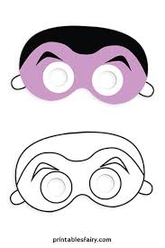 After you've finished decorating the mask, cut two slits close to the eyes, slide a. Printable Halloween Masks For Kids The Printables Fairy