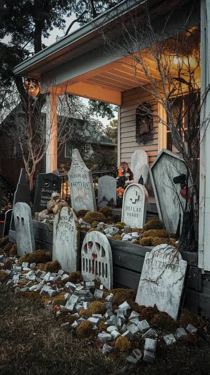 Turn your front porch into a chilling graveyard display for Halloween. Set up weathered Halloween po