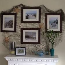 #polyvore #home #home decor #halloween home decor #fishing home decor. Fish Net And Framed Photos Beach Theme Living Room Nautical Living Room Decor