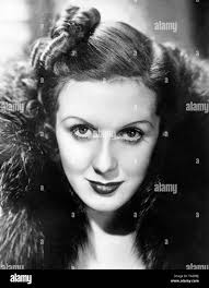 Portrait of the American actress Louise Latimer. Her hair is rolled up