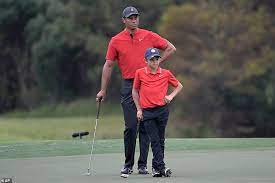Tiger Woods Ex Wife Elin Nordegren Watches Their Son Charlie Play Golf Daily Mail Online