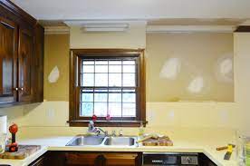 If you are removing more than one cabinet, first detach them from each other. Removing Some Kitchen Cabinets Rehanging One Young House Love