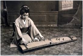 It is normally composed of 5 strings and 2 bridges one at the top and another at the bottom but doesn't have any frets. Japanese Koto Instrument For Traditional Japanese Music