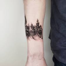 Inside the outline of the animal, is the entire hogwarts castle. Hogwarts