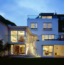 If you're building a vacation getaway retreat or primary residence in a scenic area, like the mountains, or by a lake, the more indoor/outdoor living space the better. House With Basement Hampstead Contemporary Exterior London By Jeff Kahane Associates Houzz