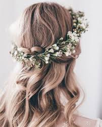If you prefer flower pins over crowns then try placing a couple to one side of the forehead, with your hair down, for a look that is imperfect. Wedding Hair Flowers 9 Floral Looks For Your Big Day