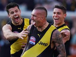 Afl superstar dustin martin and glamorous swimsuit model jessica gomes are rumoured to be in a romantic relationship. Afl Tigers Triumph Amid Trolls And Tragedy Morning Bulletin