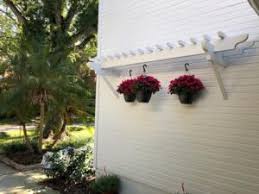 Garage door struts reinforce door sections, preventing them from bending or breaking. Garage Pergola Kits Eyebrow Pergola Kit Over Garage Door For Style Or Carport Pergoladepot Com