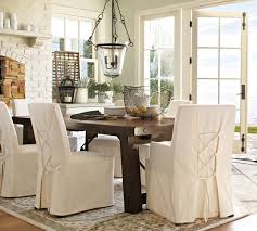18 Lovely Chair Cover Designs To Refresh The Look Of Every Dining Room Slipcovers For Chairs Dining Room Design Dining Room Chair Covers