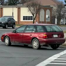 Image result for Cherry Red 2000 Envoy