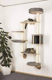 Maybe you would like to learn more about one of these? 15 Best Cat Trees For Small Spaces Based On Your Cat S Needs Tiny Partments Diy Cat Tower Cat Climbing Wall Cool Cat Trees