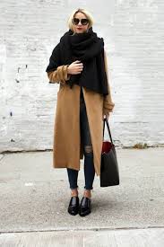 Kruger proved that a camel coat has the sartorial power to elevate even gymwear. Pinterest