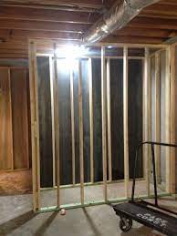 During The Framing Stage The Bathroom Wall Was Reinforced With 1 4 Steel Plate To Be Used As A Storm Shelter Finishing Basement Storm Shelter Safe Room