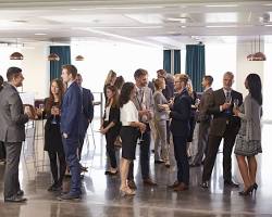 Image of people networking at a business event