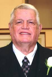 Howard Thomas Champion Obituary