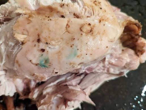 Blue/green spots on cooked chicken meat