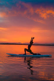 Paddleboard Yoga At Sunset Awesome Bali Floating Leaf Eco Retreat Was Named Best Retreat Center In Asia Paddle Board Yoga Yoga Photography Yoga Photos