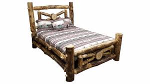 Four knotty aspen posts frame reclaimed pine to make this attractive lodge bed. Aspen Wagon Wheel Bed Ez Mountain Rustic Furniture