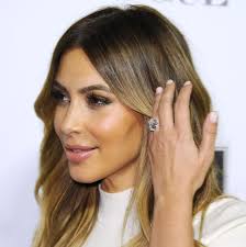 Here's How Kim Kardashian Keeps Her Engagement Ring and Diamonds Super  Sparkly