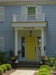 Traditional homes look best with muted colors; Slate Blue House With Yellow Door Novocom Top