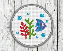 Modern cross stitch patterns counted cross stitch patterns shibori smocking plates mini cross stitch marine fish disney cartoons cartoon kids crochet animals. Cute Blue Fish With Water Plants And Bubbles Counted Cross Etsy Oya Ornekleri Kanavice Ornekleri Kanavice