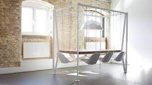 Relax and unwind with a good book and. Swing Table Duffy London