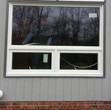 Rain glass looks the way it sounds—as if streaks of rain are pouring down the window pane. Picture Window And Awning Windows With Obscure Rain Glass Rocky River Ohio Integrity Windows