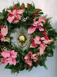 The beauty of the wreath will enhance tenfolds when lit by candles. 20 Ways To Decorate With Poinsettias For The Holidays Hgtv S Decorating Design Blog Hgtv