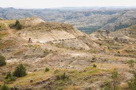 The high point in the state is the summit of white butte in slope county at an elevation of 3,506 feet above sea level. This North Dakota Bike Trail Is Stunning Just Hope You Survive It The New York Times