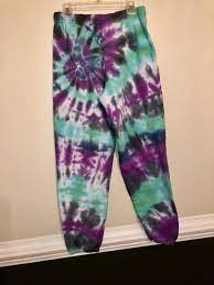 Before dyeing, it's important to soak your garment in warm water to get the fibres ready to take in the dye. Custom Tie Dye Sweatpants Etsy Tie Dye Sweatpants Tie Dye Techniques Tie Dye Diy
