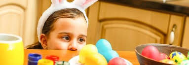 Two kids having fun playing with their eyes closed with an Easter egg.  3541307 Stock Photo at Vecteezy