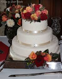 Bouquet in hand on a background of grass row of bridesmaids. Wedding Cake Flowers By Sweet Violets Turramurra Wedding Posy Ideas