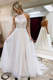 The cut shows off your shoulders and back, draws the eye upwards and balances out the body. Buy A Line Halter Tulle Wedding Dress With Top Lace Backless Beach Wedding Dresses Stk15547 Online Idealrobe