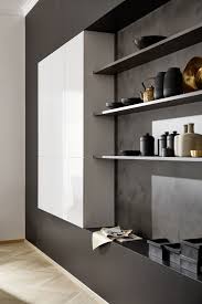 Un Diseno Depurado Y Minimalista En Esta Combinacion De Modulos Cerrados Sin Tiradores Y Estanteria Abiert Cocina Minimalista Diseno De Cocina Cocinas Modernas